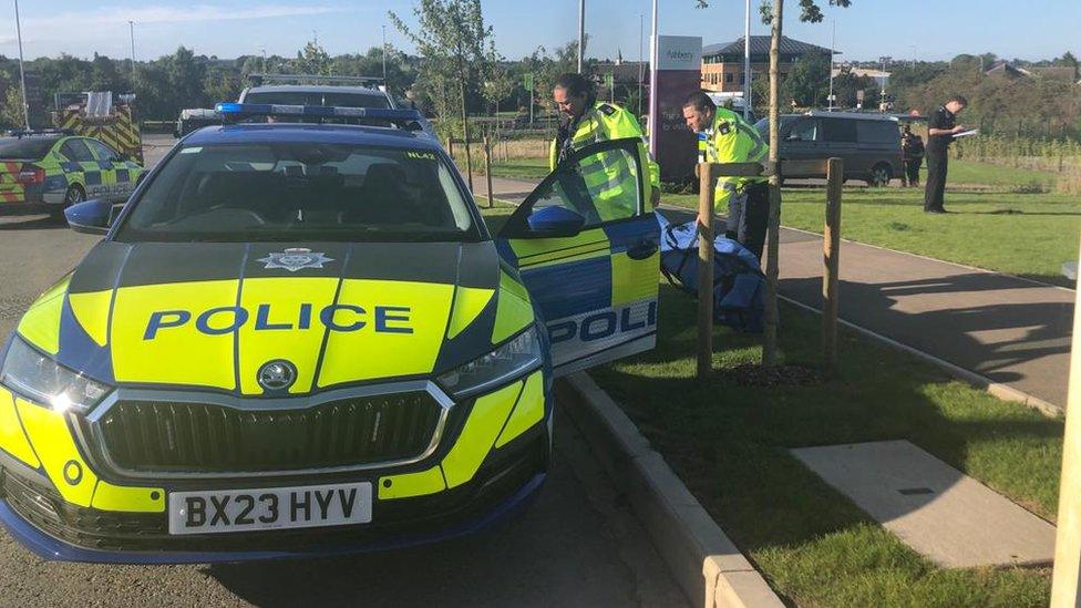 A police car at the scene