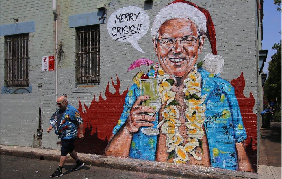 A mural depicting Scott Morrison wearing an unbuttoned Hawaiian shirt