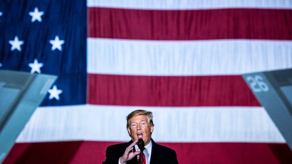 President Donald Trump speaks as he participates in a signing ceremony for the National Defense Authorization Act for Fiscal Year 2020