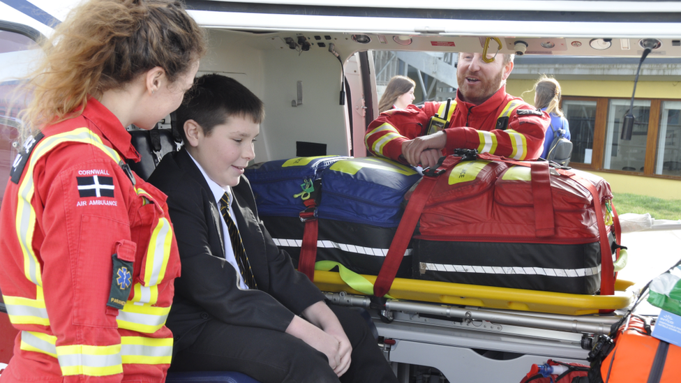 Paramedic Louise Lamble shows Finlay the air ambulance