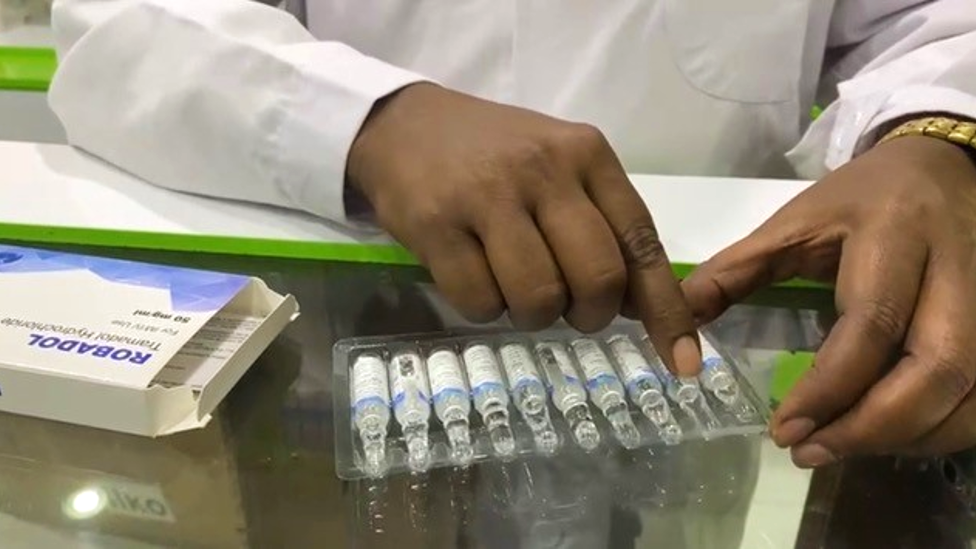 A doctor handling injectable drugs popular with young women in Somalia