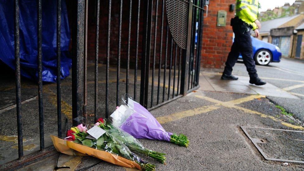 Flowers left near to the scene in Lambeth, south London, where a 16-year-old boy died after being stabbed on Monday evening