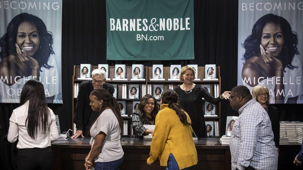 Michelle Obama signs copies of her bestseller Becoming at Barnes & Noble in New York City.