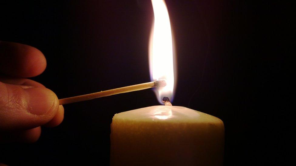 A candle being lit