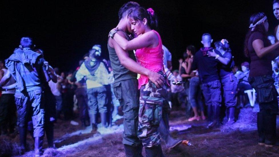 Rebels dance during the Farc conference