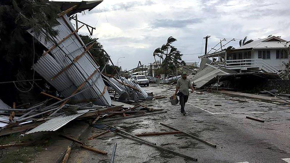 Image shows the flooding and damage in Tonga's capital of Nuku"alofa after Cyclone Gita hit the country.