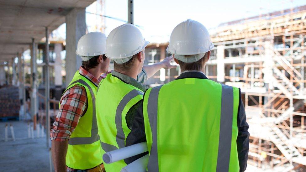 Stock image of builders