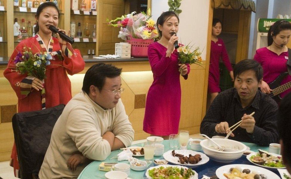 North Korean women perform in a restaurant in Liaoning, China (file image)