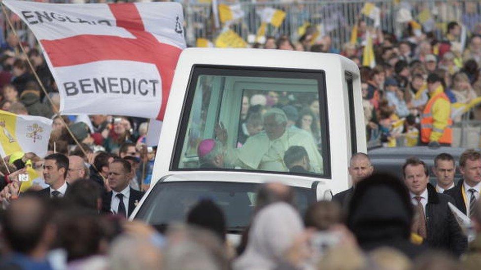 Large crowds of people to see the former Pope