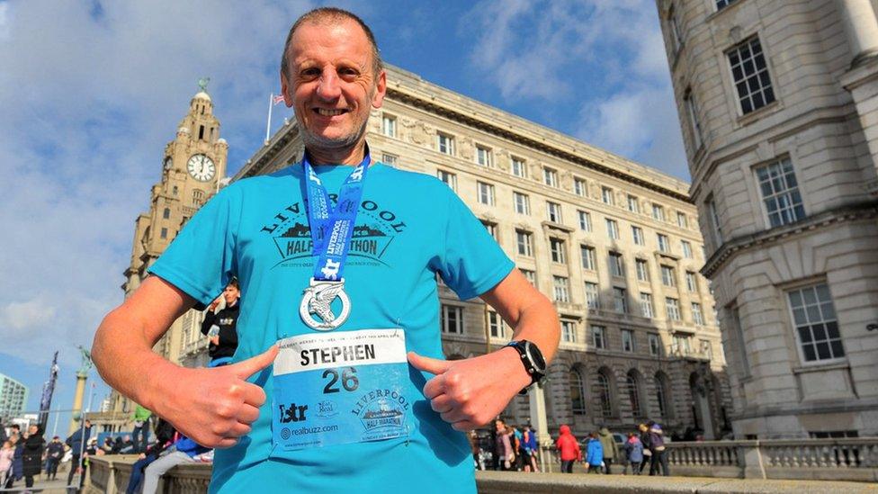 Stephen Symons poses in Liverpool post race