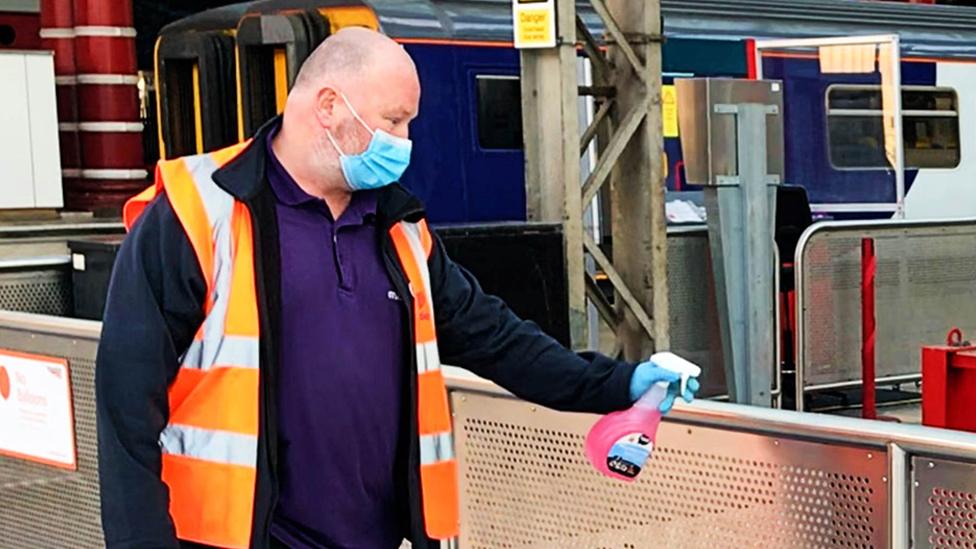 Undated handout photo of a handrail being cleaned at Liverpool Lime Street station