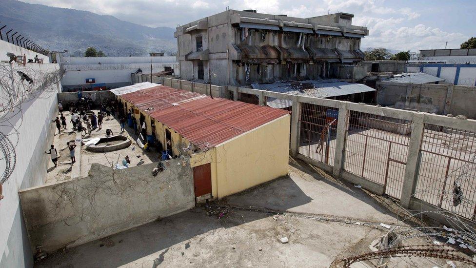 Prisoners in a courtyard at the National Penitentiary in downtown Port-au-Prince