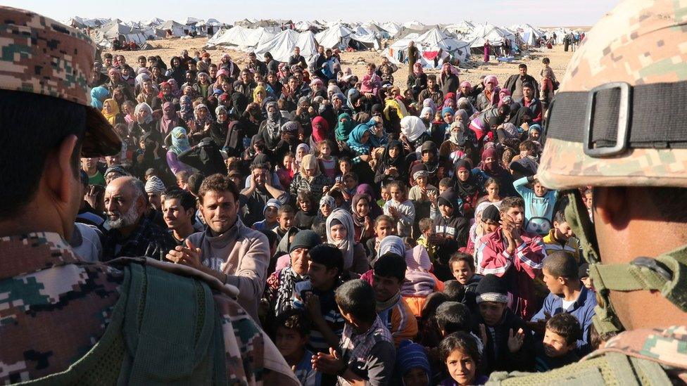 Syrian refugee children in a camp between the Jordanian and Syrian borders