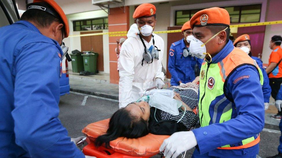 A victim is evacuated to hospital after the toxic chemical spill in Pasir Gudang in southern Malaysia