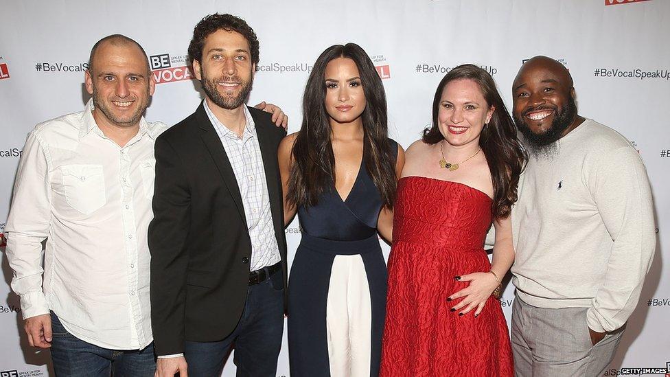 Demi Lovato with the director and three subjects of her new documentary, Beyond Silence