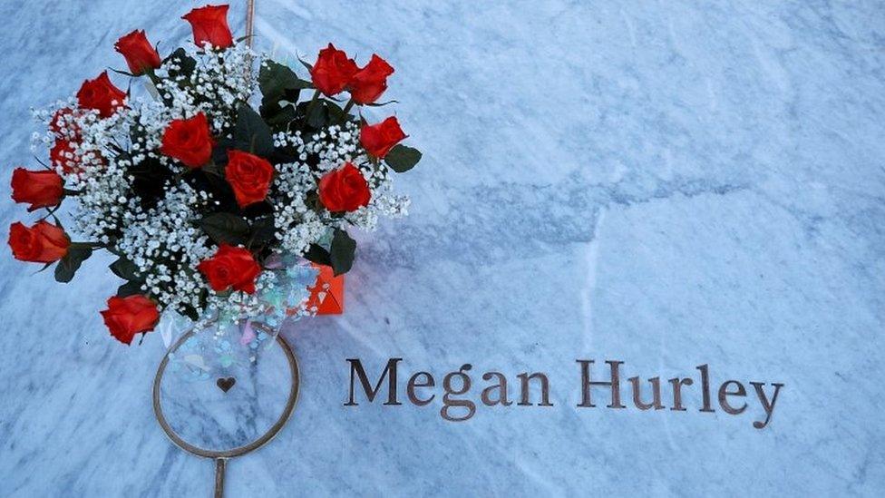 Flowers left by Megan Hurley's name on memorial