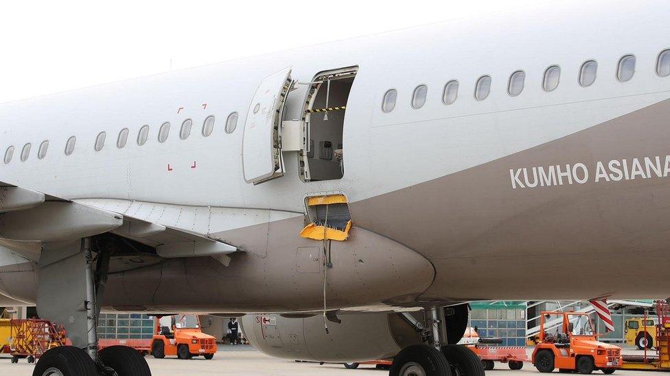 The Asiana Airlines plane landed safely in South Korea after a passenger forced open an emergency door.