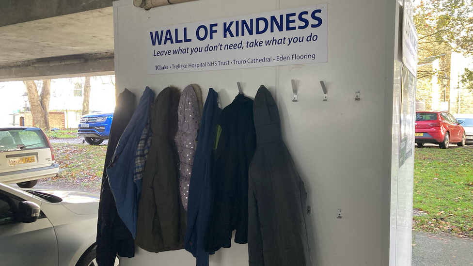 Coats on the wall of kindness