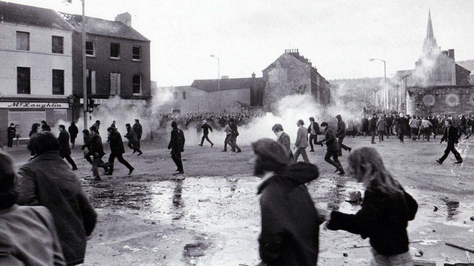 Demonstrators run after tear gas explosions on "Bloody Sunday", January 1972 in Northern Ireland.