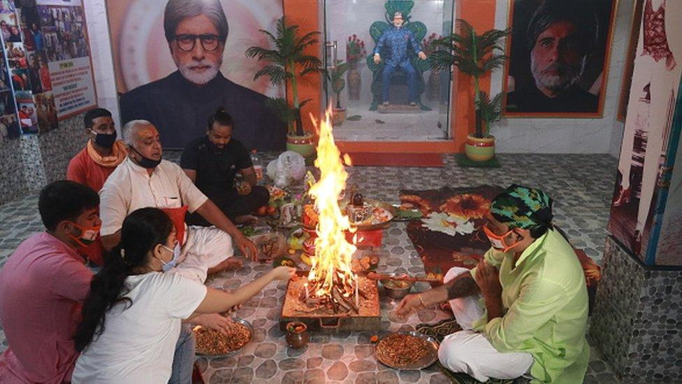 Fans of Bollywood Superstar Amitabh Bachchan and Hindu priest in Kolkata perform prayers for his recovery as he tested positive for COVID-19 on July 12, 2020.