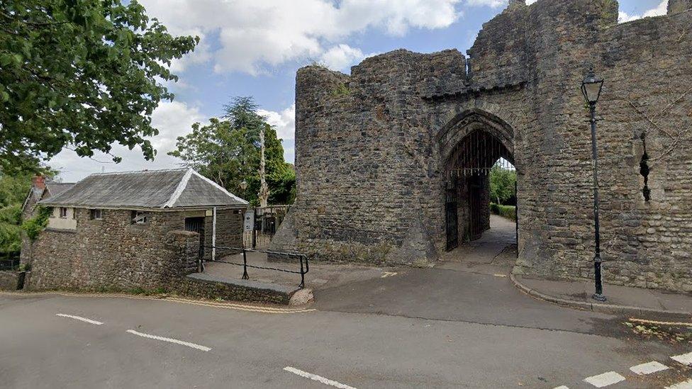 The toilets (left) next to the ruins of the Old Bishop's Castle