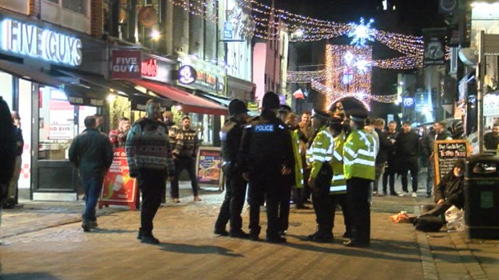 Police officers patrolling Canterbury at night