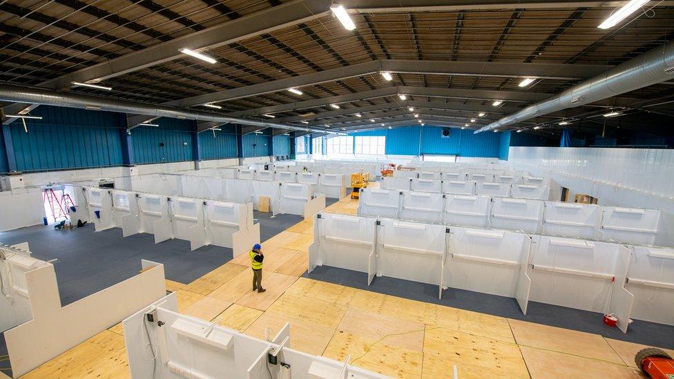 Deeside Leisure Centre being kitted out as a field hospital