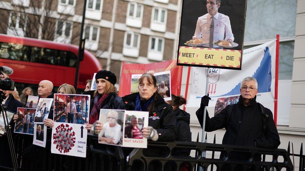 Protestors gathered outside the inquiry where Mr Sunak was giving evidence