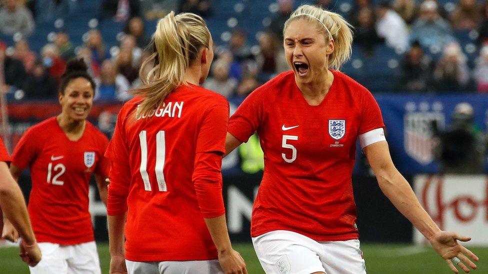 England players celebrating during a game