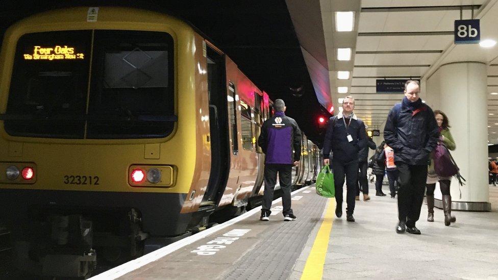 West Midlands Railway train on platform at Birmingham New Street