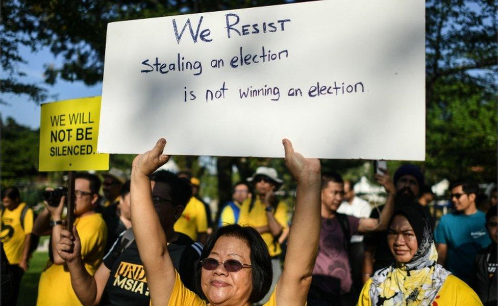 Woman joins a protest against alleged election irregularities in Kuala Lumpur, Malaysia (28 Mar 2018)