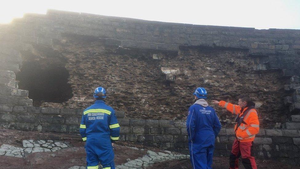 Partial sea defence collapse