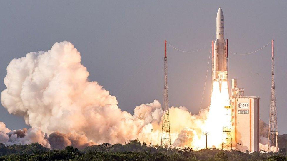 A rocket carrying the NBN's first satellite is launched into space from French Guiana in 2015