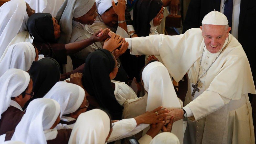 Pope Francis greets faithful after leading the mid-morning prayer at the Monastery of the Discalced Carmelites in Antananarivo, Madagascar, September 7, 2019