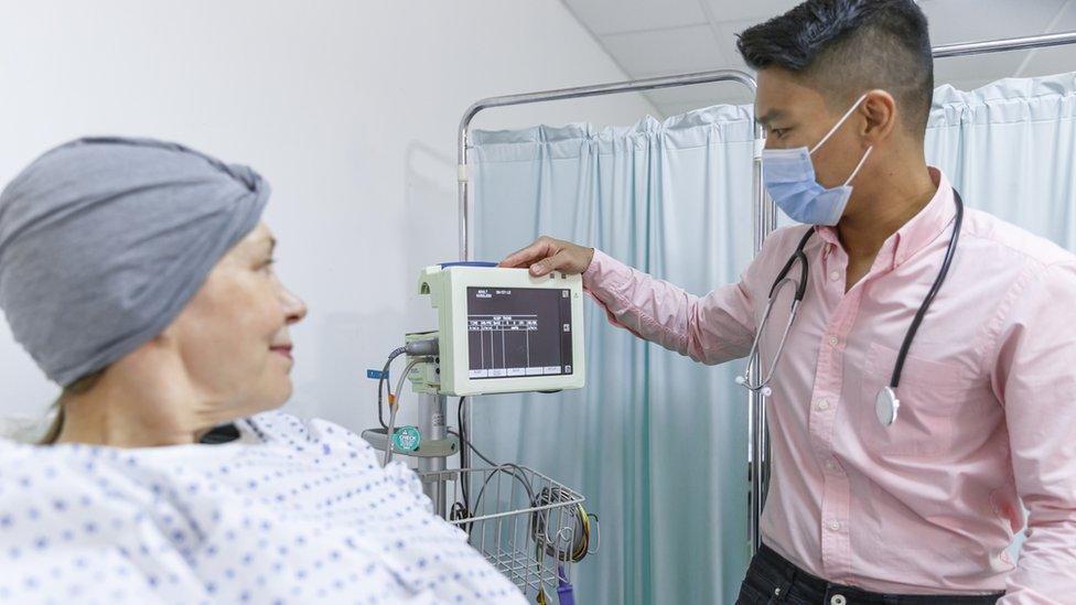 Woman in hospital bed