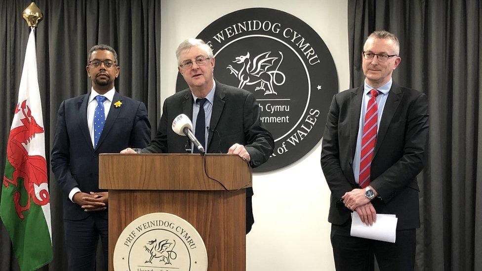 First Minister Mark Drakeford, flanked by health minister Vaughan Gething and NHS Wales chief executive Dr Andrew Goodall