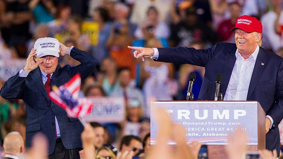 Donald Trump receives the endorsement of Senator Jeff Sessions at a rally in August 2015.