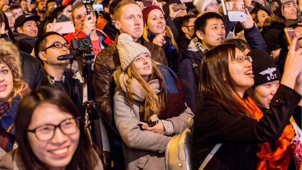 Crowds watched the London fireworks from Victoria Embankment during the new year celebrations