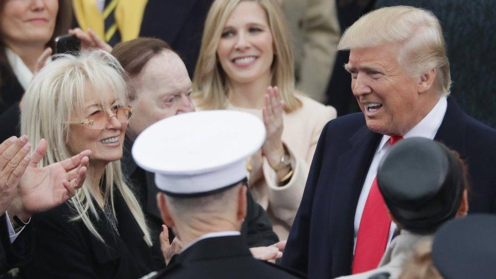 Tom Barrack, Miriam Adelson and Sheldon Adelson greet U.S. President-elect Donald Trump on the West Front of the U.S. Capitol on January 20, 2017 in Washington, DC