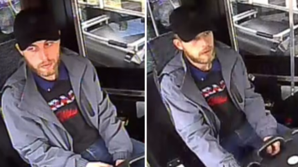 CCTV image of man in driver's seat of bus