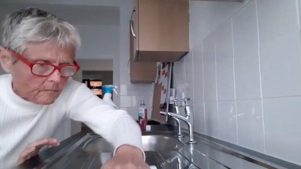 Lesley Turner cleaning her kitchen