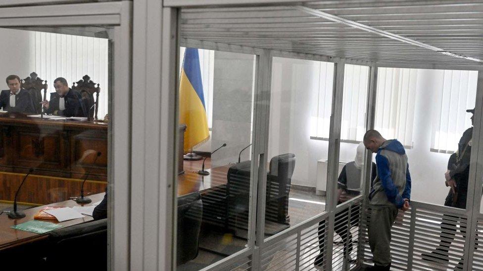 Image shows Vadim Shishimarin sitting in dock