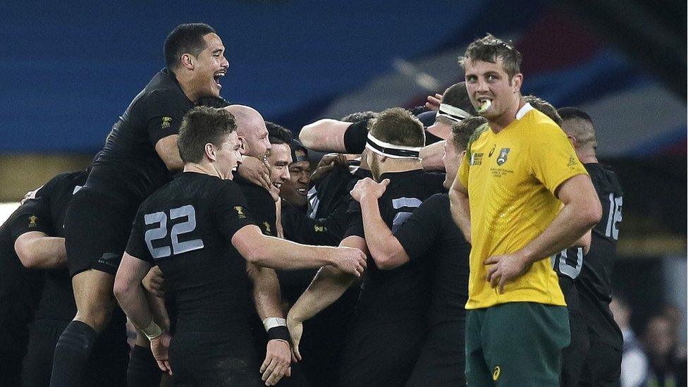 New Zealand players celebrate after the Rugby World Cup final between New Zealand and Australia at Twickenham