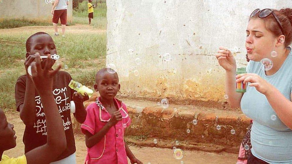 Chelsea Cameron and children in Uganda