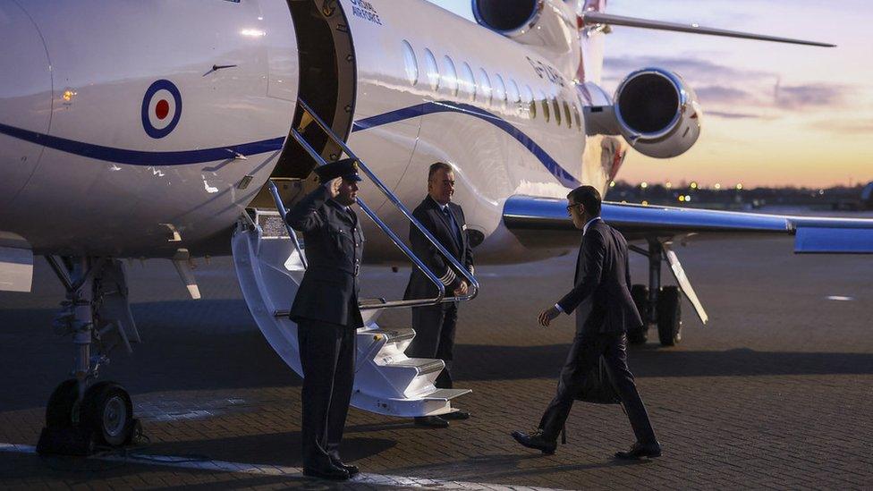 Prime Minister Rishi Sunak boards an RAF plane as he heads to visit the Rutland Healthcare Centre