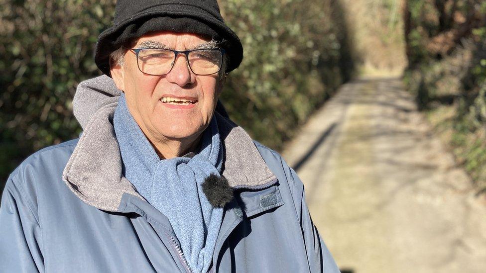 Councillor Richard Budden standing on a rural road in south Wiltshire