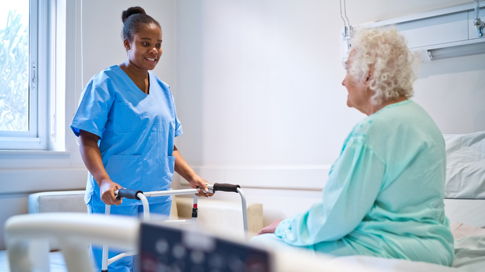 Patient in hospital with nurse