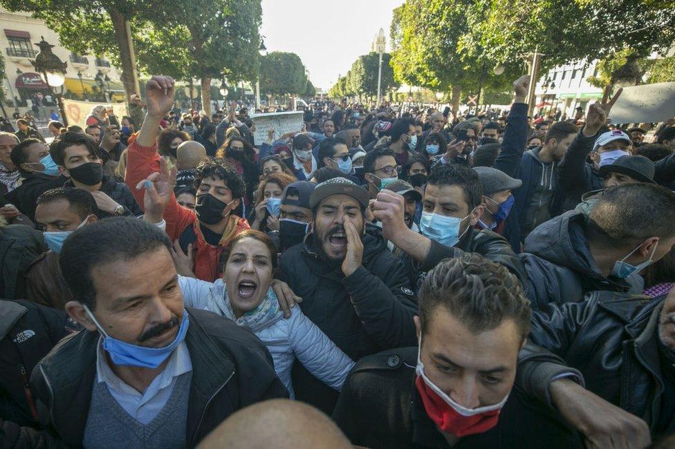 Security forces and demonstrators clash during a demonstration in the capital Tunis, Tunisia on January 19, 2021. Demonstrators demanded the development of the country and the release of those arrested in connection with recent nighttime protests.