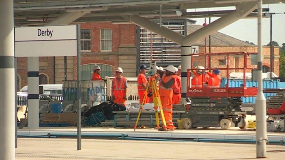 Workmen at Derby station