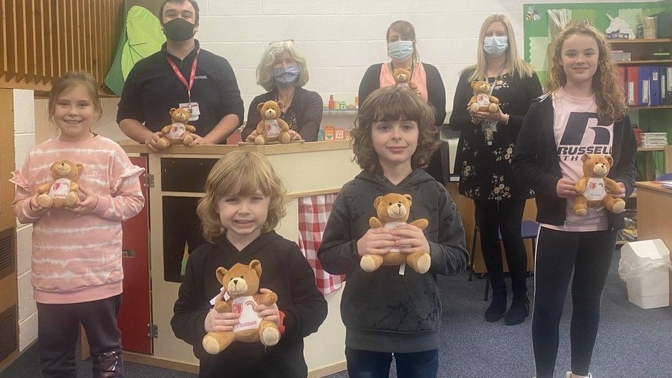 Pupils and staff with teddy bears